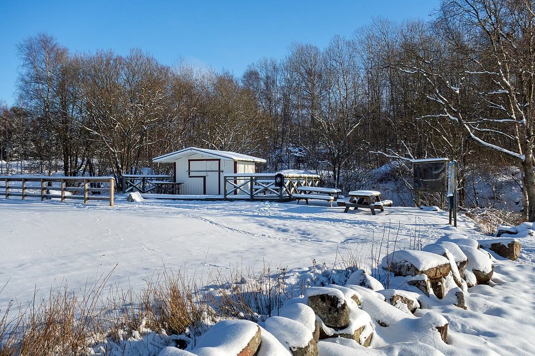 A small wooden house in winter