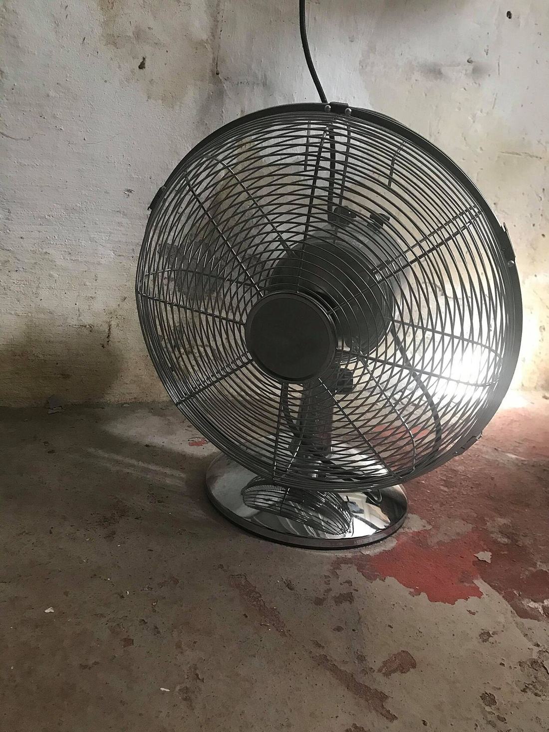A fan giving a cool breeze on a hot day