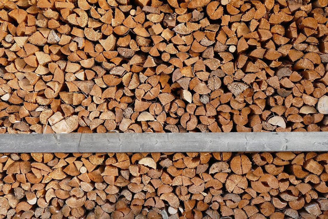 A supply of stacked firewood